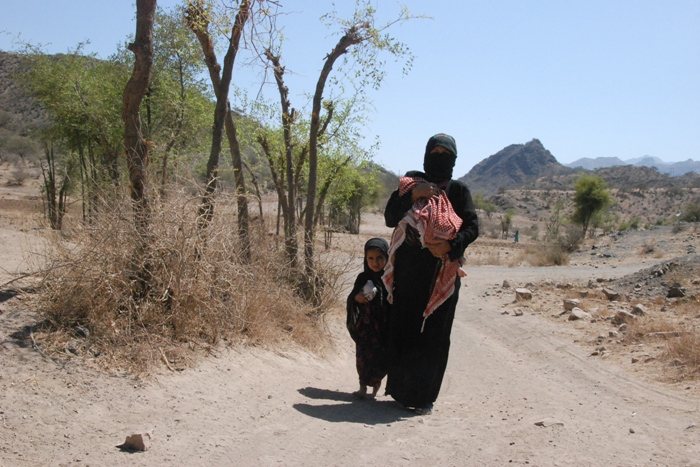 This mother has walked for over an hour to bring her sick baby to the Al Aghmour health centre. Only half of Yemen's 23 million population live within reach of healthcare, making the prevention of disease especially important.
