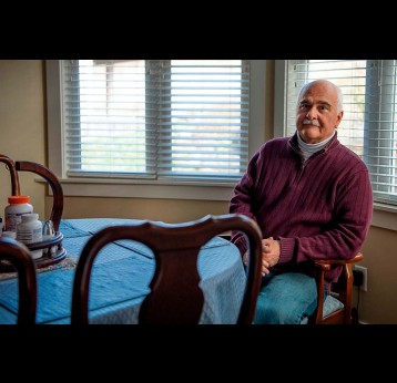 Brad Fuller survived polio as a toddler, a few years before the vaccine was available. Decades later his issues with balance and muscle weakness intensified, symptoms that were diagnosed as post-polio syndrome. Credit: Maddy Alewine for Undark