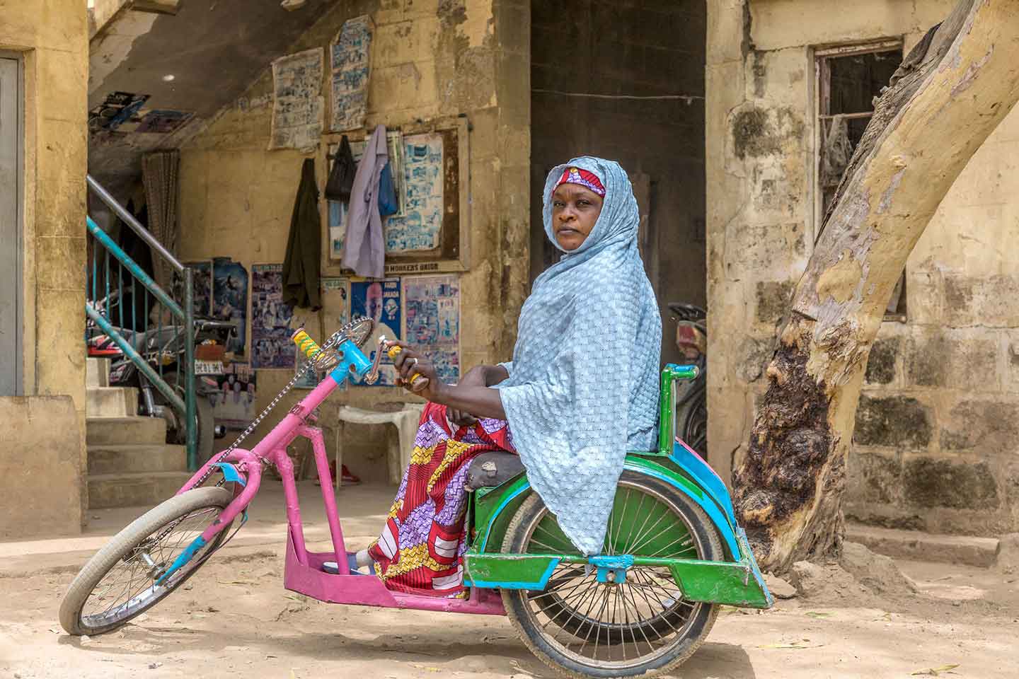  Paralysed as a child by polio, Mariam Umar from Kano State has been working as a community mobilizer with the polio eradication programme for seven years. “I help mobilize people, so my community would accept the vaccine when they see my situation.” © Andrew Esiebo/WHO