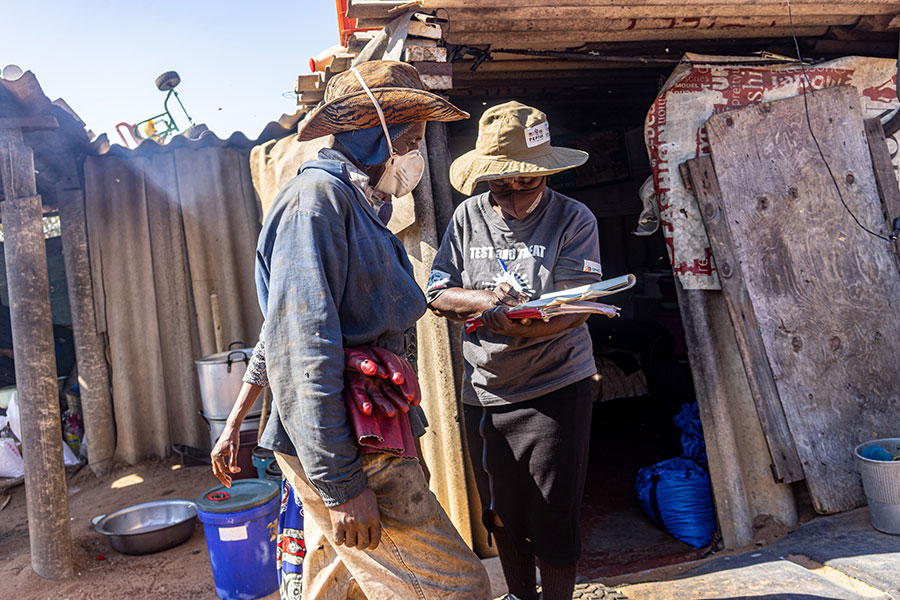 Waste picker Khumbulani Tshuma, 44, registers his name