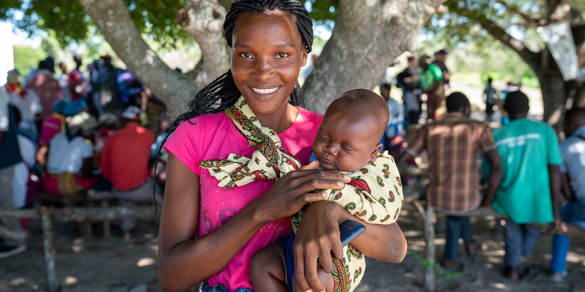 A mother and her child at a community health outreach session in a rural area north-west of Maputo. Credit: Gavi/2020/Svetlomir Slavchev