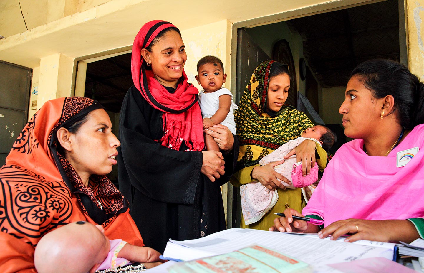 Gavi/2015/GMB Akash – Parents attend the vaccine session at the EPI centre in Dhaka, Bangladesh