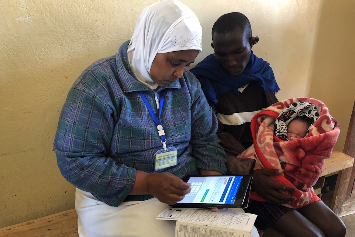 A female health worker recording data. Credit: Gavi/2018/D. Rowe