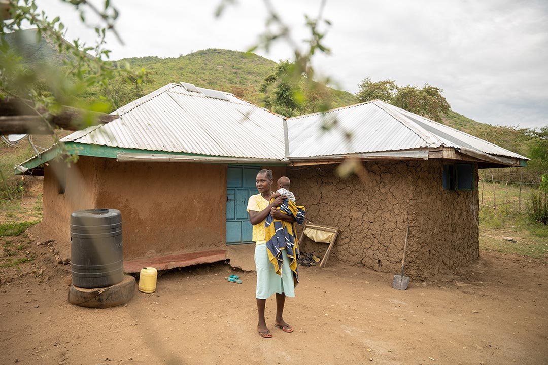  Millicent, mother of 7, with her lastborn son Brighton at her home in Nyandhiwa area in Homabay county. Gavi/2023/Kelvin Juma