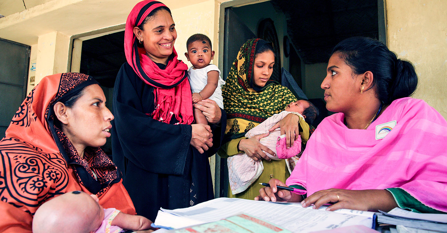 Gavi/GMB Akash- Parents attend the vaccine session at the EPI centre in Dhaka, Bangladesh