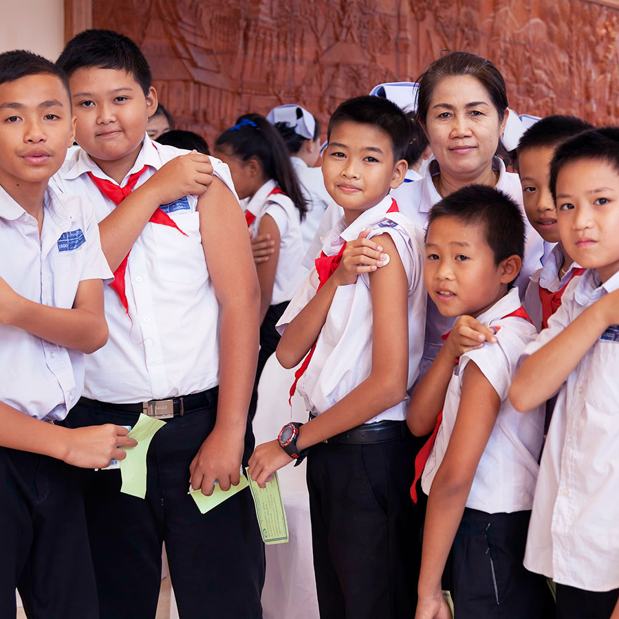 Students in Vientiane, Lao People’s Democratic Republic (PDR), after receiving their first dose of Japanese encephalitis (JE) vaccine. In 2015, Lao PDR became the first country to use support from Gavi to protect its children from JE. Credit: Bart Verweij  