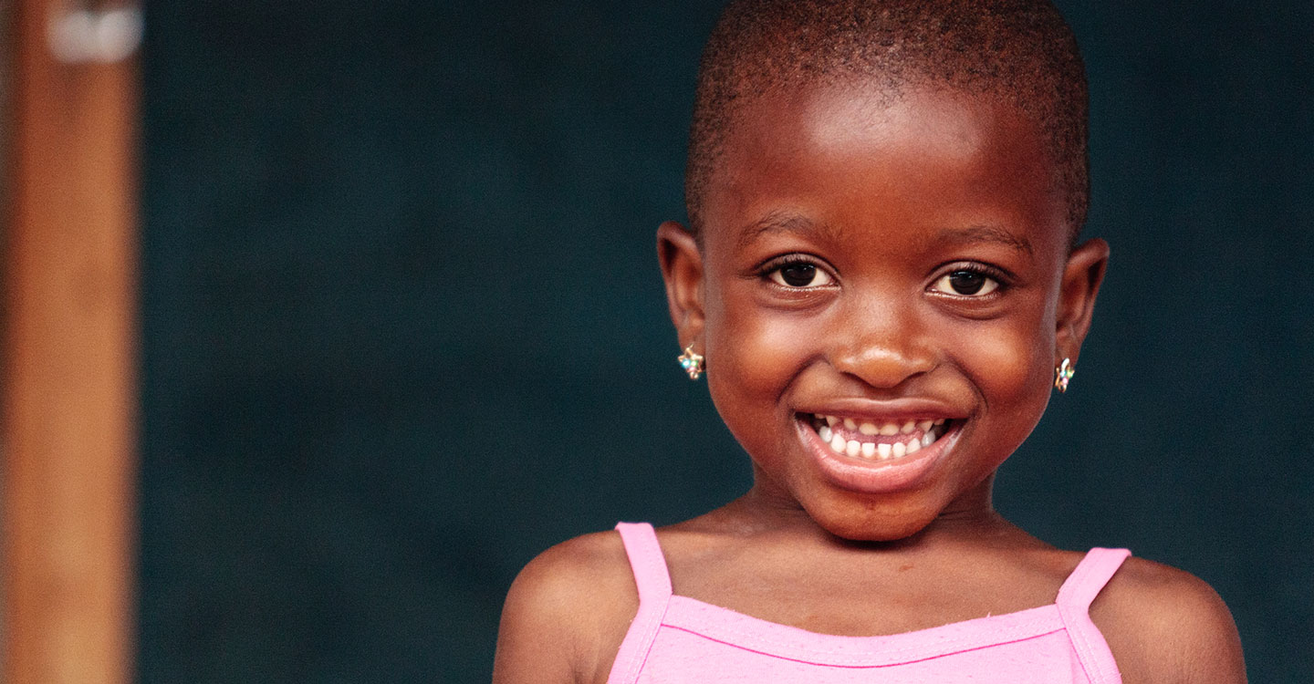 Little girl smiling in Ghana