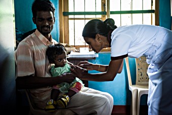 UNF Sri Lanka vaccination - father with child