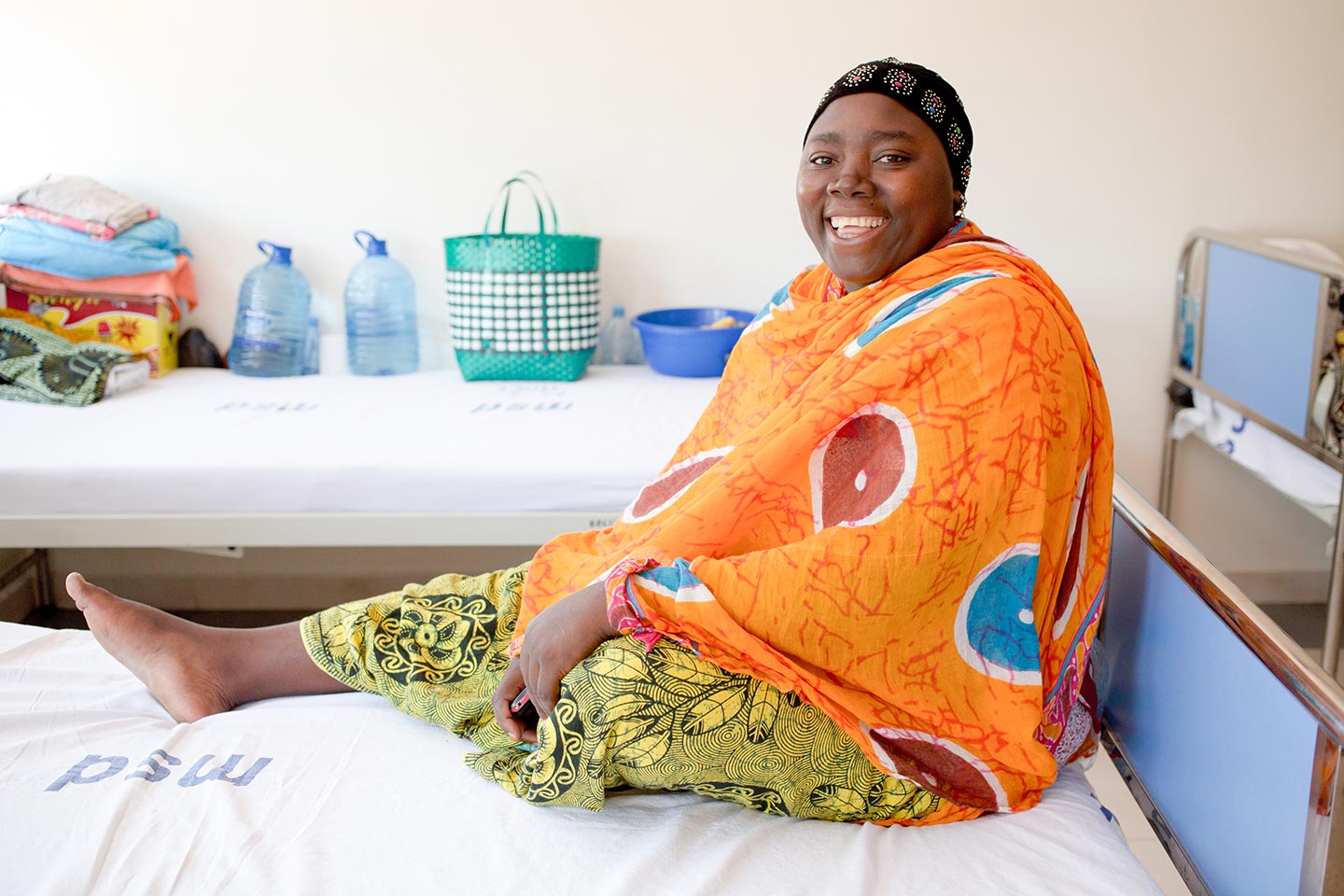 Cervical cancer patient Mwashamba Rajabu poses with her head scarf to cover her hair loss at the Ocean Road Cancer Institute in Dar es Salaam. – Credit: Gavi/2014/Karel Prinsloo
