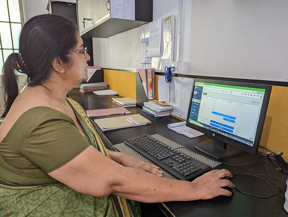 Dr Gawrie de Silva, District Tuberculosis Control Officer at the Colombo Chest Clinic, using the ePIMS system. Credit: Aanya Wipulasena