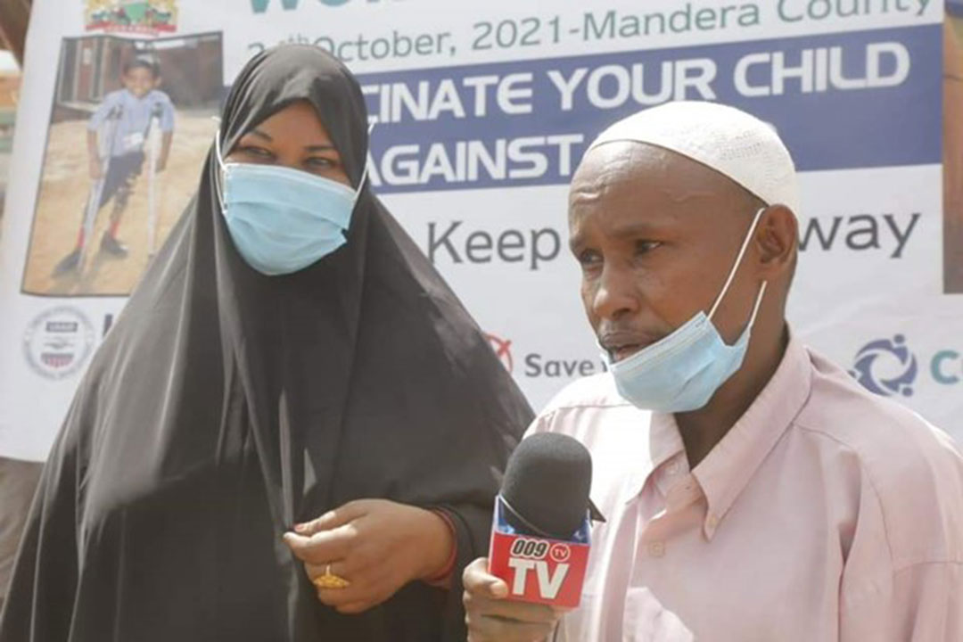 Mr Noor Haji addressing the press after bringing his child to be vaccinated against measles.