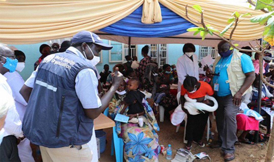 Young mothers present children for polio vaccination in Bor Town. Photo credit: WHO