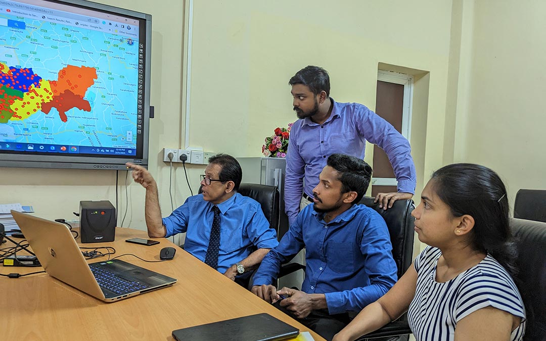 Director of the Anti-Leprosy Campaign Dr Prasad Ranaweera with undergraduates of the University of Sabaragamuwa who helped to create the new GIS for leprosy. Credit: Aanya Wipulasena