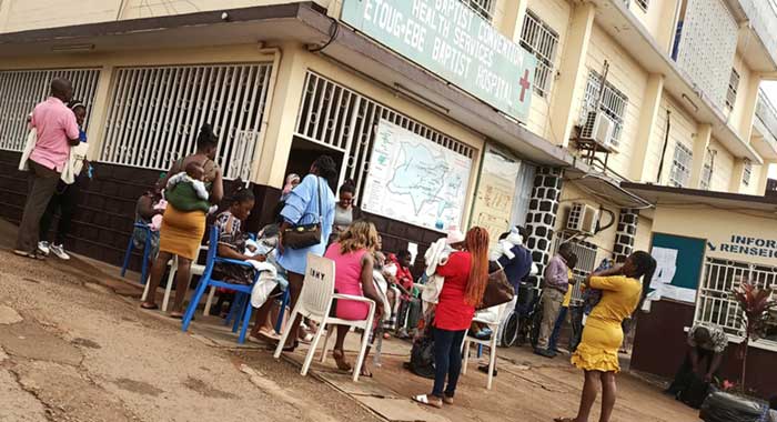 Parents queue up at the Etoug-Egbe Baptist Hospital in Cameroon's capital, Yaounde, to have their children vaccinated against poliomyelitis.