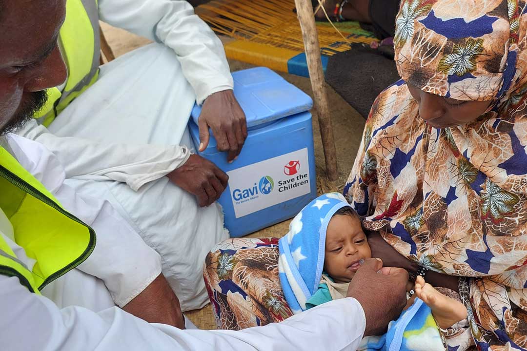 Infant Muhammad Saleh, whose family is nomadic, receives his first vaccination in a hard-to-reach part of Aqiq locality, Red Sea state, 2024. Credit: Asrar Fadulelsied