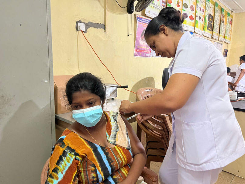 A soon to be mother gets vaccinated. Credit: Aanya Wipulasena