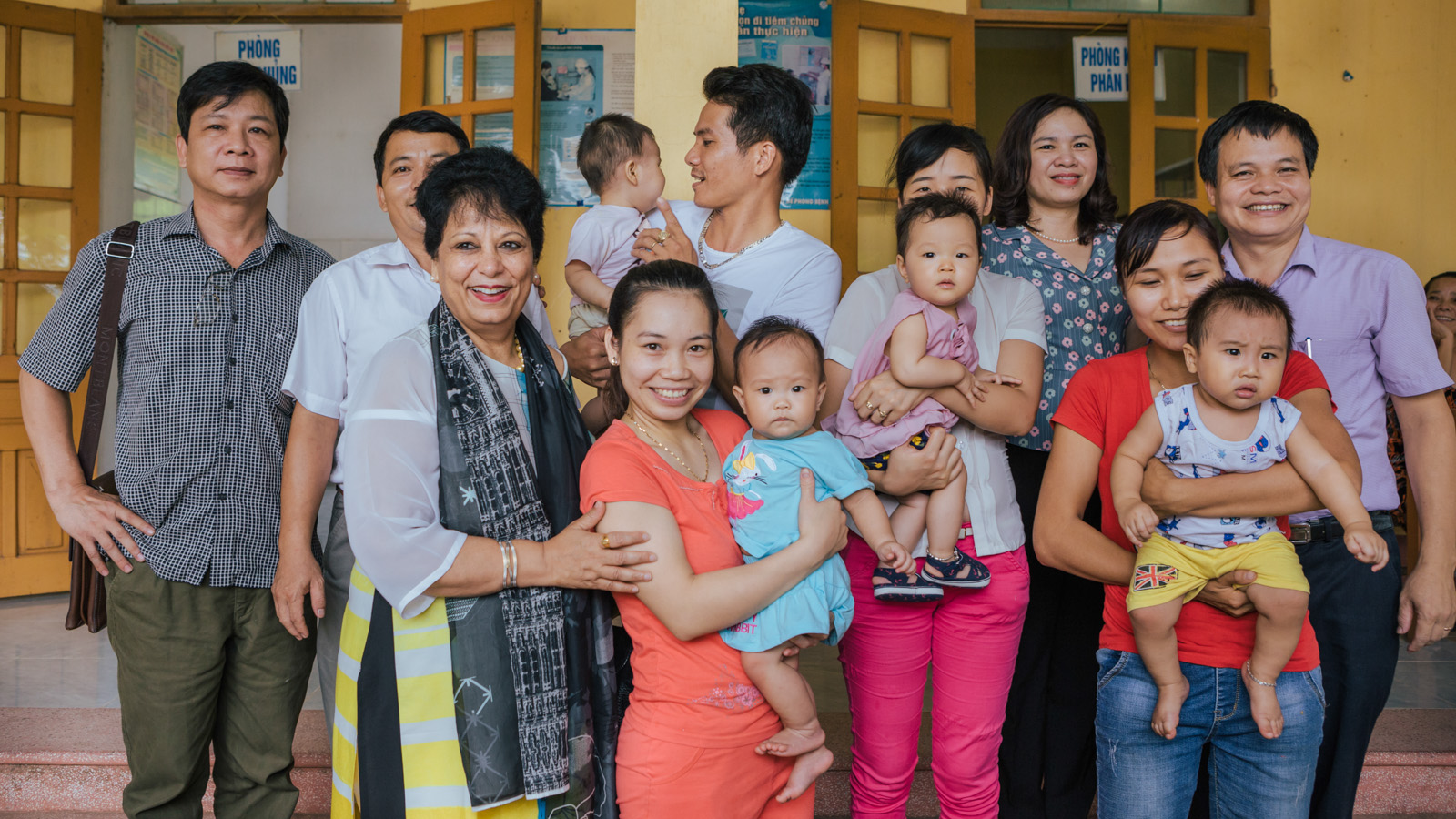 The author with parents at the community clinic. Photo: Gavi 2017/ Đạt Nguyễn.