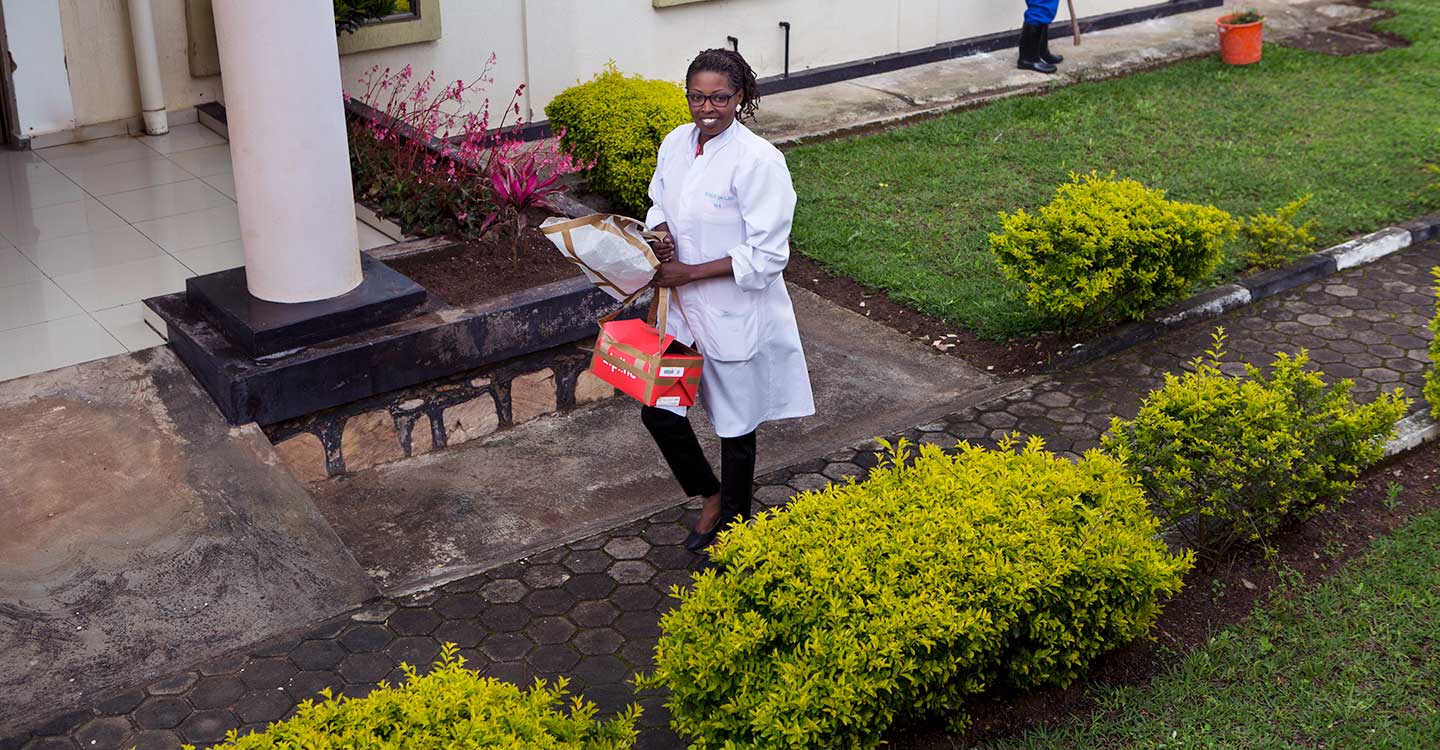 Nurse Umwamariya Alice collects a Zipline delivery. Credit: Karel Prinsloo/Gavi/Arete