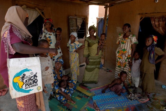 Traditional birth attendants such as Talatu Adamu (left) perform multiple primary health care roles. They can help reduce the numbers of women who die in childbirth and promote immunisation and child health during their visits. As a woman, Talatu is able to visit women at home and bring essential health messages.