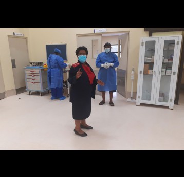 Matron Nurse Sibongile Simelane inspecting the emergency ward and staff prior to the arrival of a COVID-19 patient. Credit: Nonduduzo Kunene