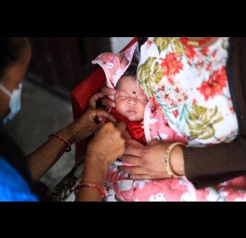 A baby getting vaccinated in Nepal. Credit: © UNICEF and U.S. CDC/ UN0666532/Laxmi Prasad Ngakhushi 