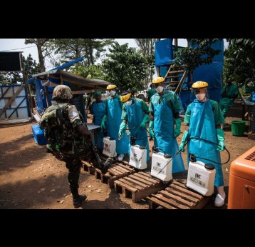 The large public health apparatus assembled to fight Ebola created more problems. Alexis Huguet/AFP via Getty Images
