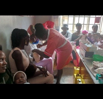 A nurse at Mukono General Hospital vaccinating a child. Credit: Dicta Asiimwe