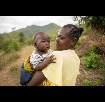 Millicent, mother of 7, with her lastborn son Brighton at her home in Nyandhiwa area in Homabay county, Kenya. 4th October, 2023. Gavi/2023/Kelvin Juma