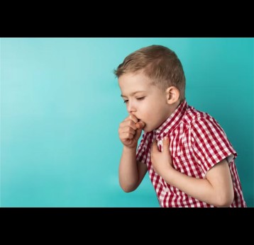 A coughing boy. Credit: Zdan Ivan/Shutterstock