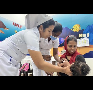 R. Dhaarmika supervises a midwife at a Maternal and Child Welfare Center in Colombo. Credit: Aanya Wipulasena