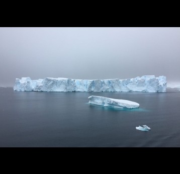 An iceberg in the ocean. Credit: DSD on Pexels