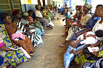 Mothers wait to vaccinate their babies at the Kpele-Eleme Health Centre in Togo