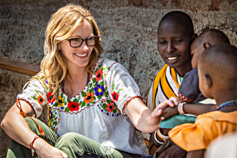 Julia Roberts talks to young boys in Kenya during a special edition of “Running Wild”