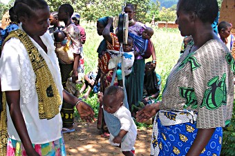 Child being weighed at Mpwapwa, Tanzania