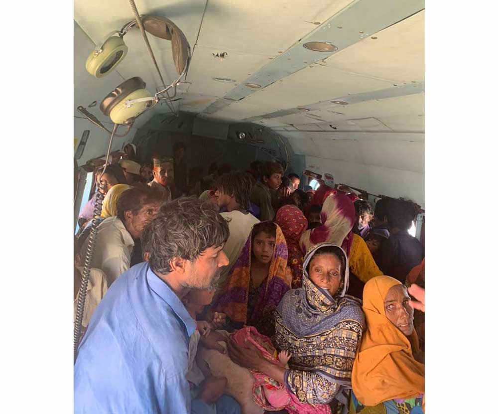 Women and children being shifted to temporary camps. Credit: Ministry of National Health Services and National Disaster Management Authority