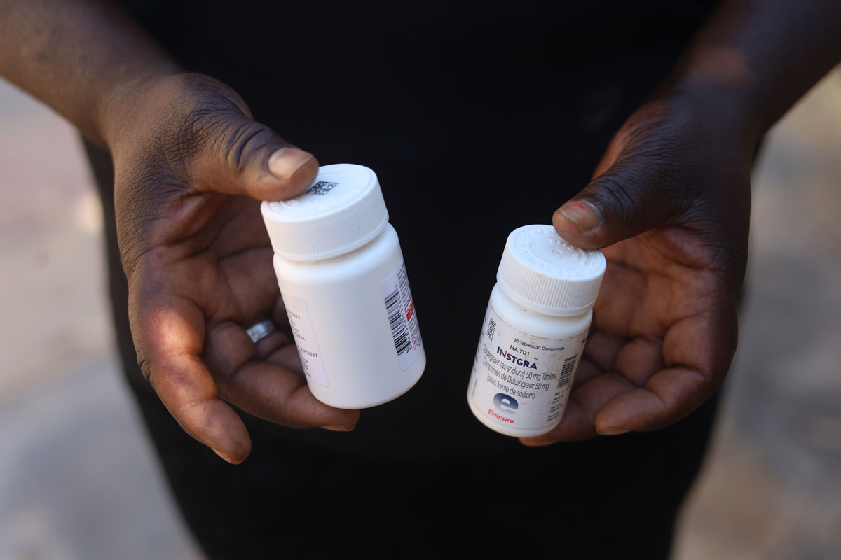 Tracy showing some of her HIV treatment in Hobhouse, Mutare. Credit: Farai Shawn Matiashe/Gavi/2024
