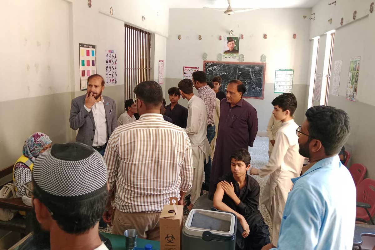 Children being administered the typhoid vaccine during the emergency campaign in Karachi. Credit: Rahul Bashara