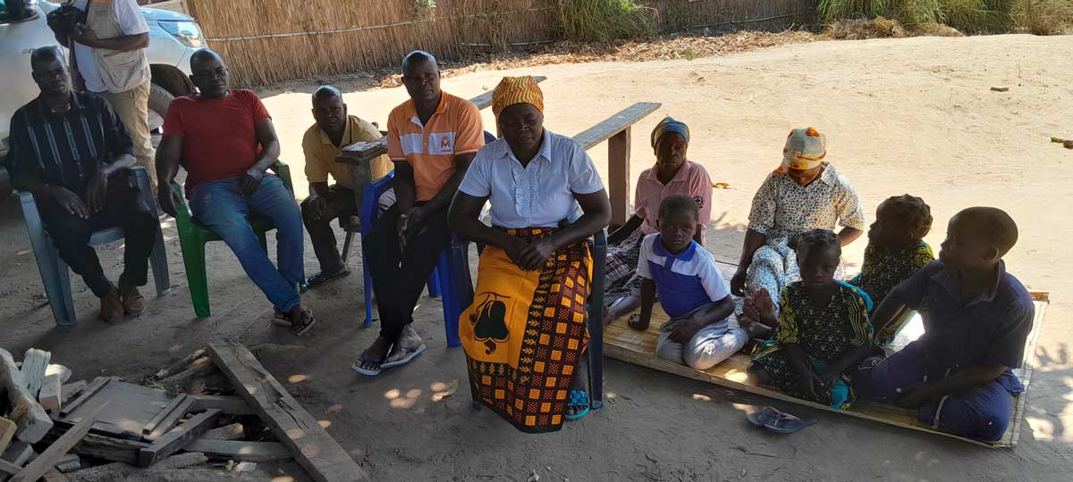 Cacila Oliveira explains to villagers the importance of vaccination. Credit: Charles Mangwiro.