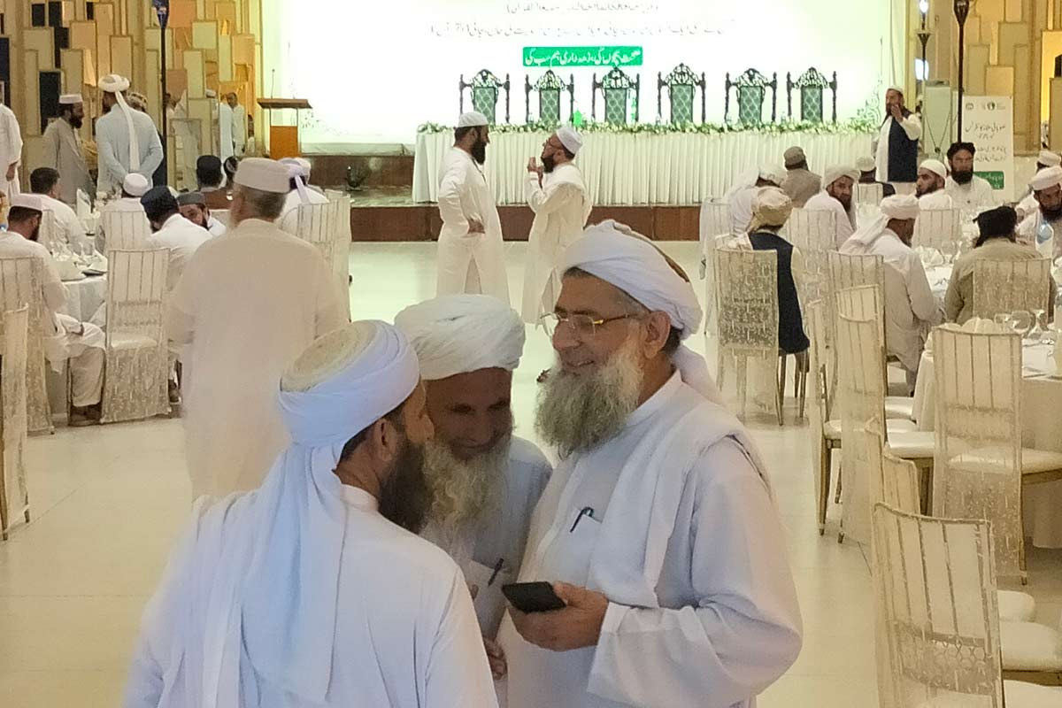 Religious scholars exchanging views during an ulema conference held in Peshawar on September 5, 2024. More than 190 participants declared their unwavering support for immunisation and polio vaccination. (Photo by Adeel Saeed).