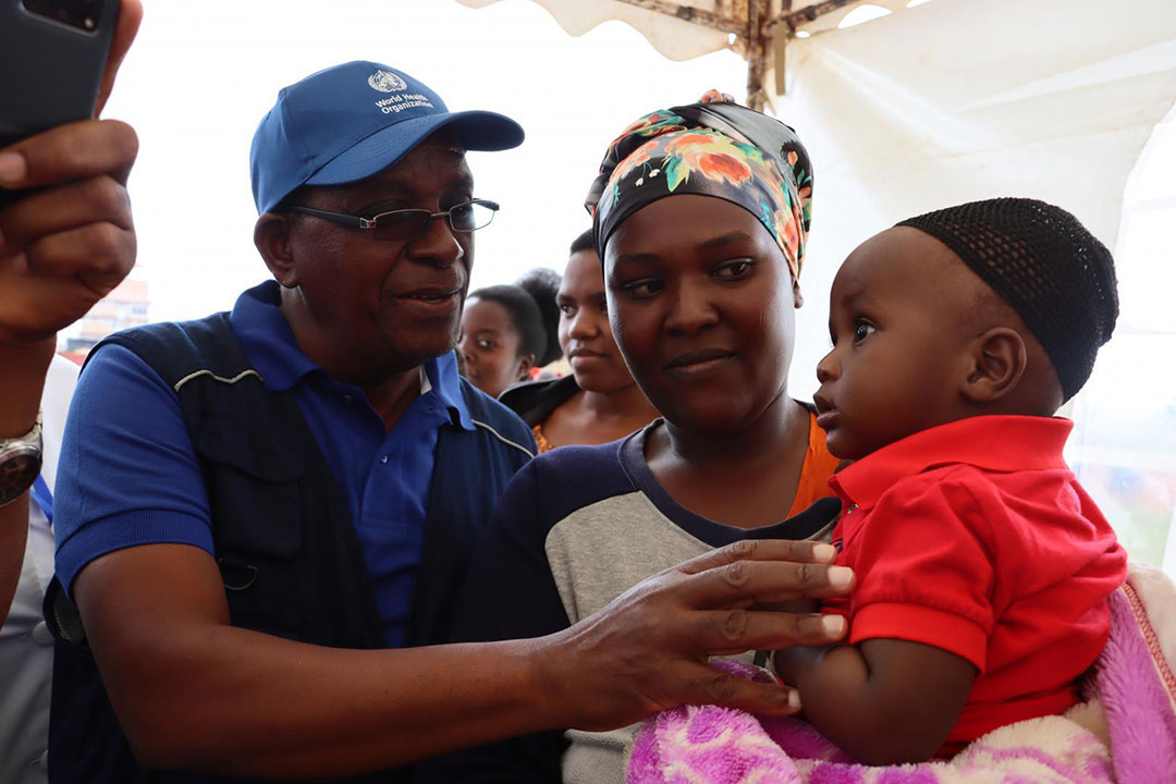 The World Health Organization staff interacting with a parent who had taken her son for vaccination in Babati, Tanzania. Credit: WHO Country Office-Tanzania