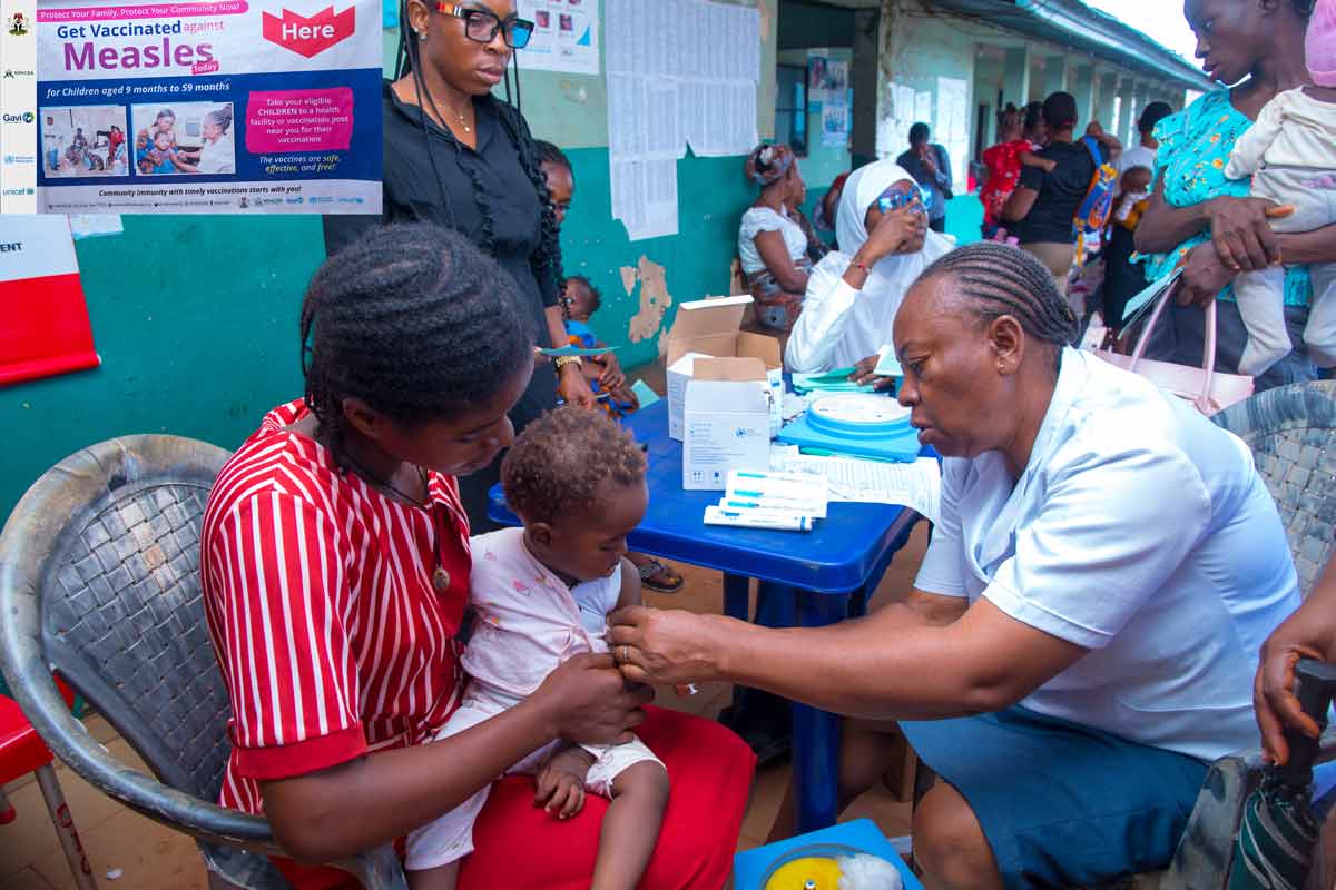 Children in Enugu State are vaccinated against measles during a major catch-up campaign. Credit: UNICEF/2024/Chika Ezeugwu