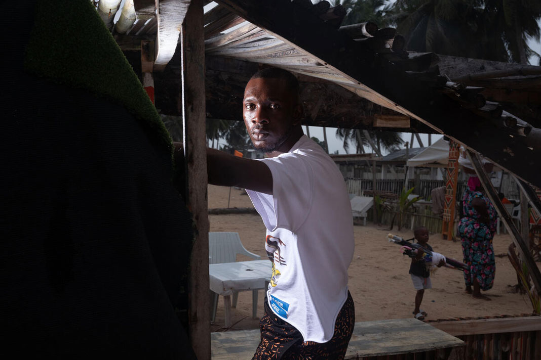 Jean-Luc, photographer, 24. Abidjan, Côte d'Ivoire. June 2025. © Newsha Tavakolian / Magnum Photos