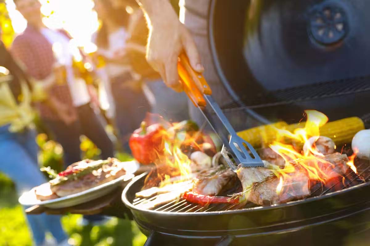 BBQ safely this summer. New Africa/Shutterstock