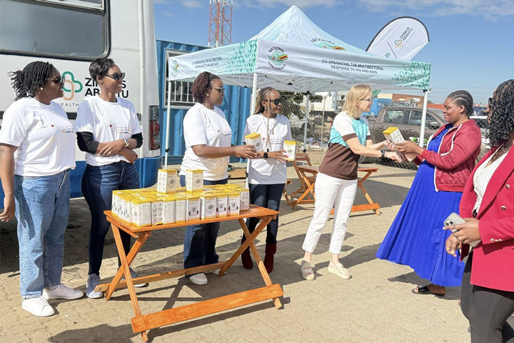 Blood pressure machines being handed over to women in the community. Credit. Zim TechWomen