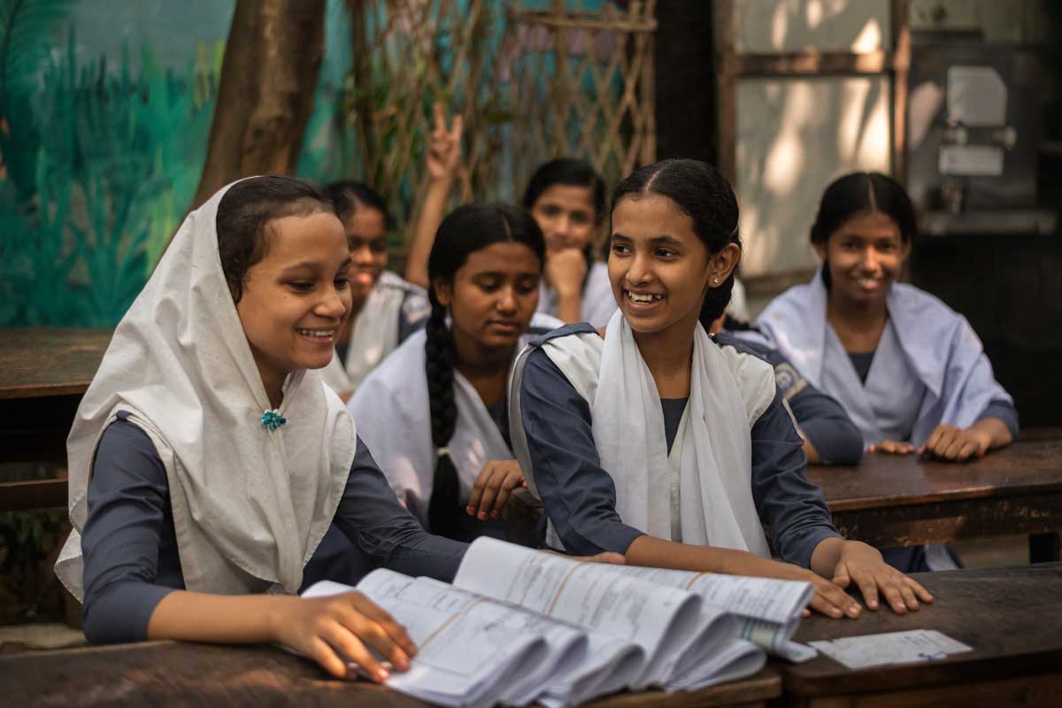 Girls in Bangladesh sitting together during a HPV vaccination session. Credit: Gavi/2023/Ashraful Arefin