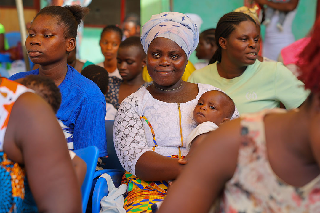 Mothers at an immunisation session at the Ominako Community-Based Health Planning and Services (CHPS) facility in the Eastern Region of Ghana, on May 6, 2025. Gavi/2025/Nipsh Dennis