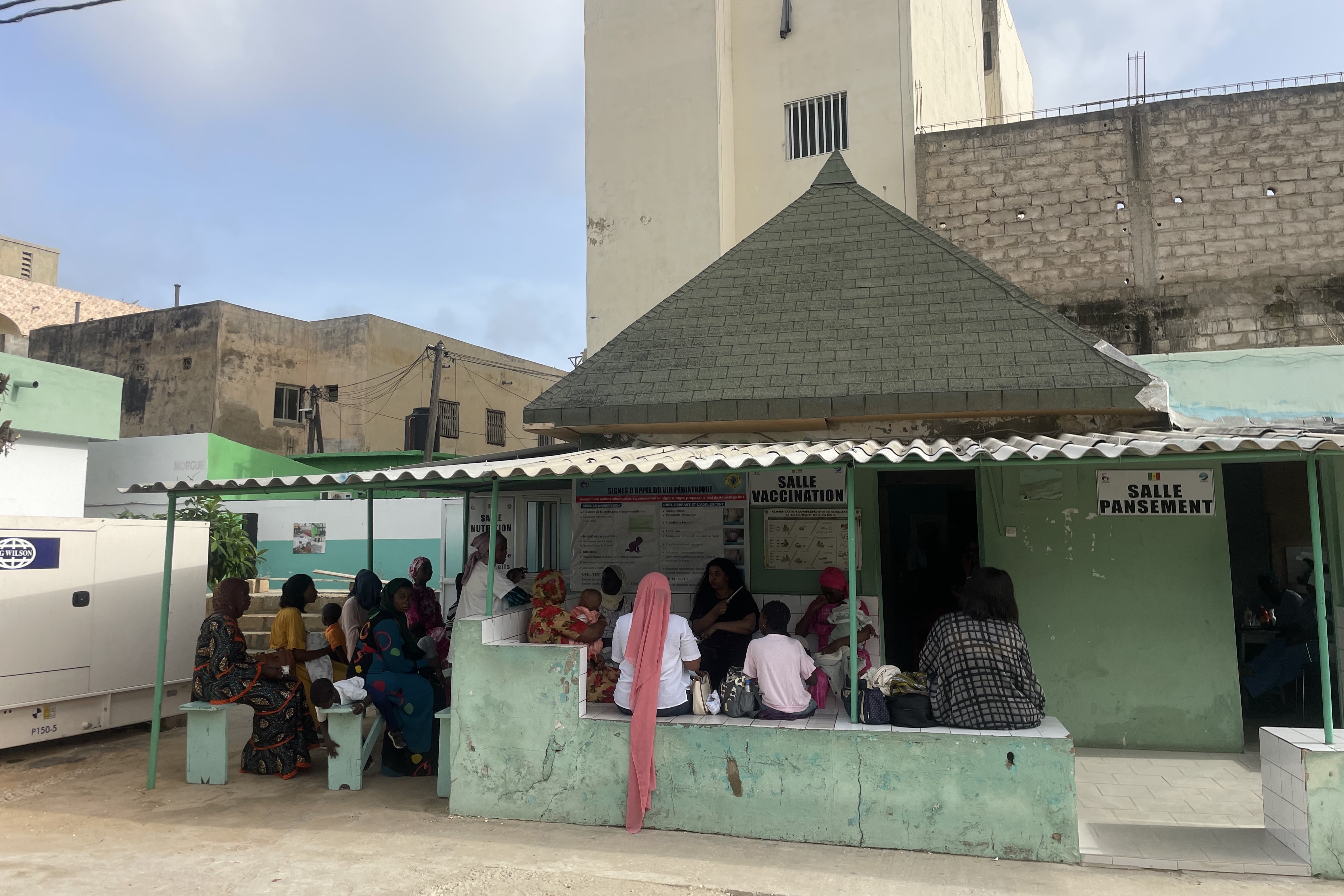 At the Philippe Maguilène Senghor health center in Dakar, mothers wait with their babies in front of the vaccination room. Credit: Allison Fernandes